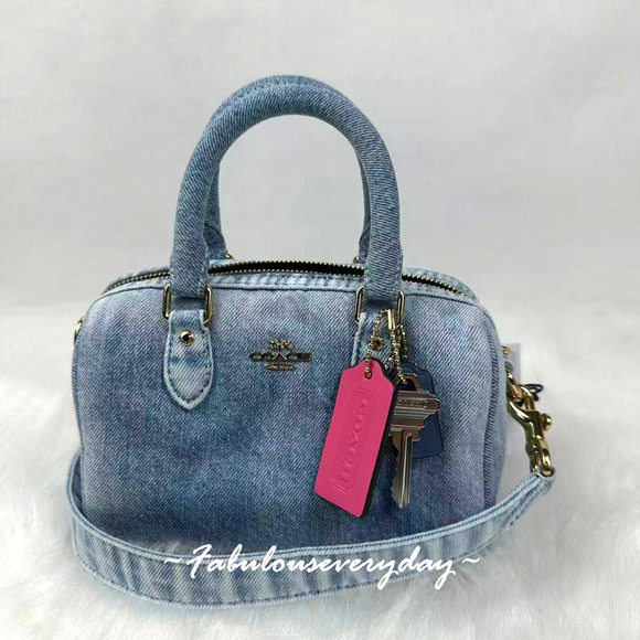Coach Handbags - Coach Mini Rowan Crossbody Bag In Loved Denim With Charms Light Indigo CDY30 NWT